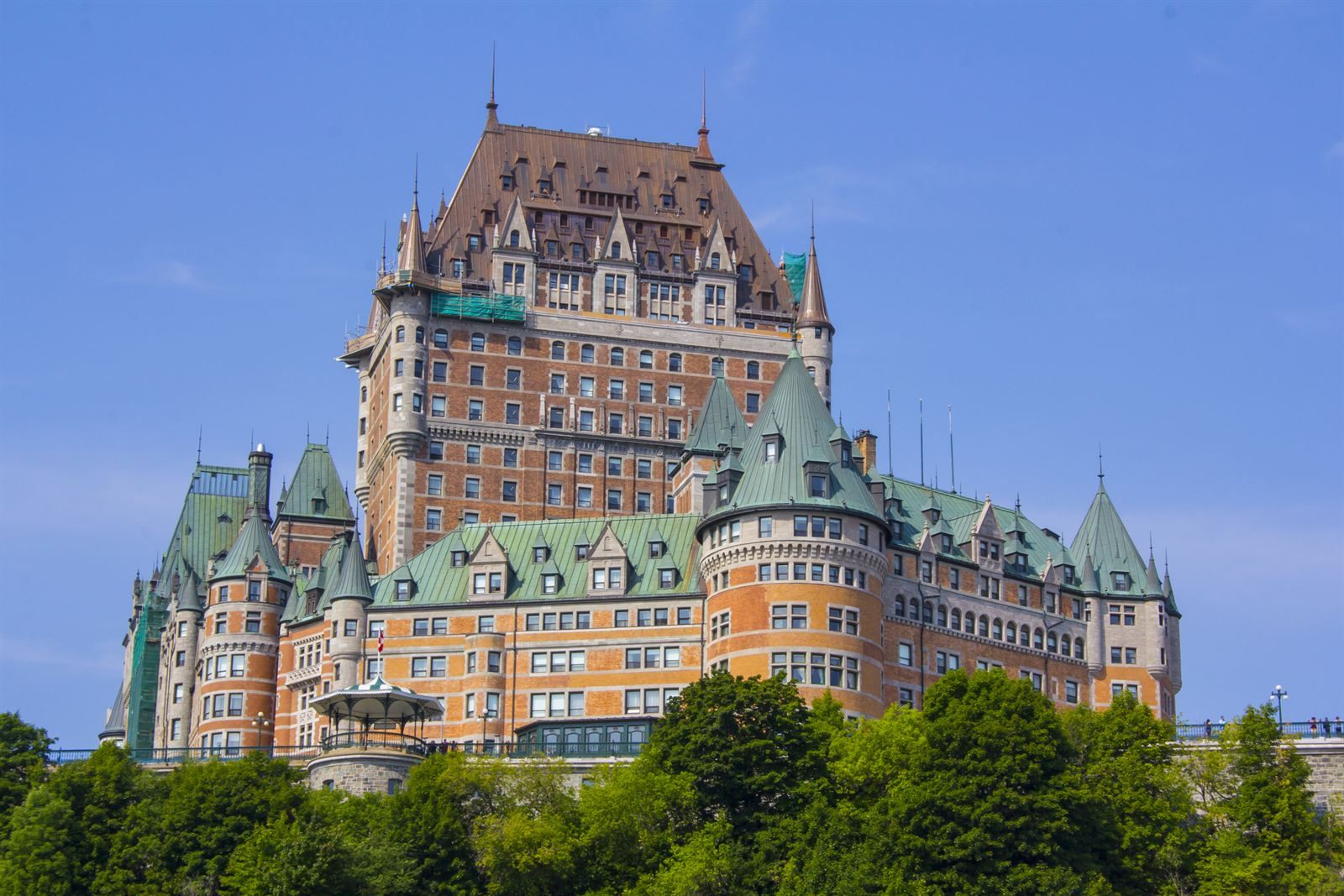 The turreted Chateau Frontenac rising above trees in Quebec City